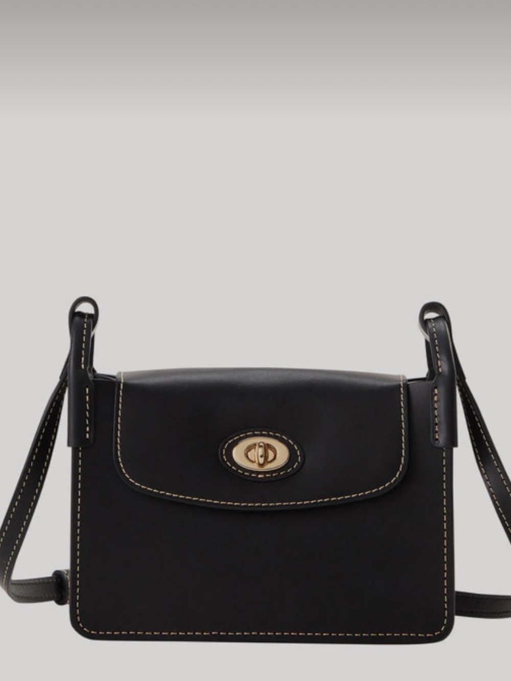 Dooney & Bourke Sweety leather Pinky bag in black.